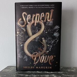 Serpent & Dove Hardcover Book